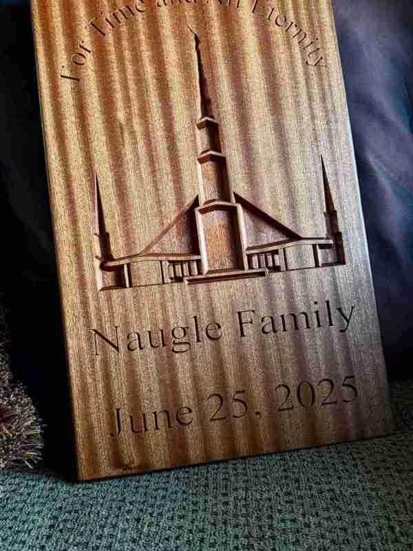 Custom walnut family name sign with church icon and established date